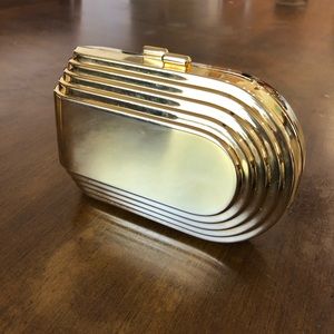 Unique gold clutch